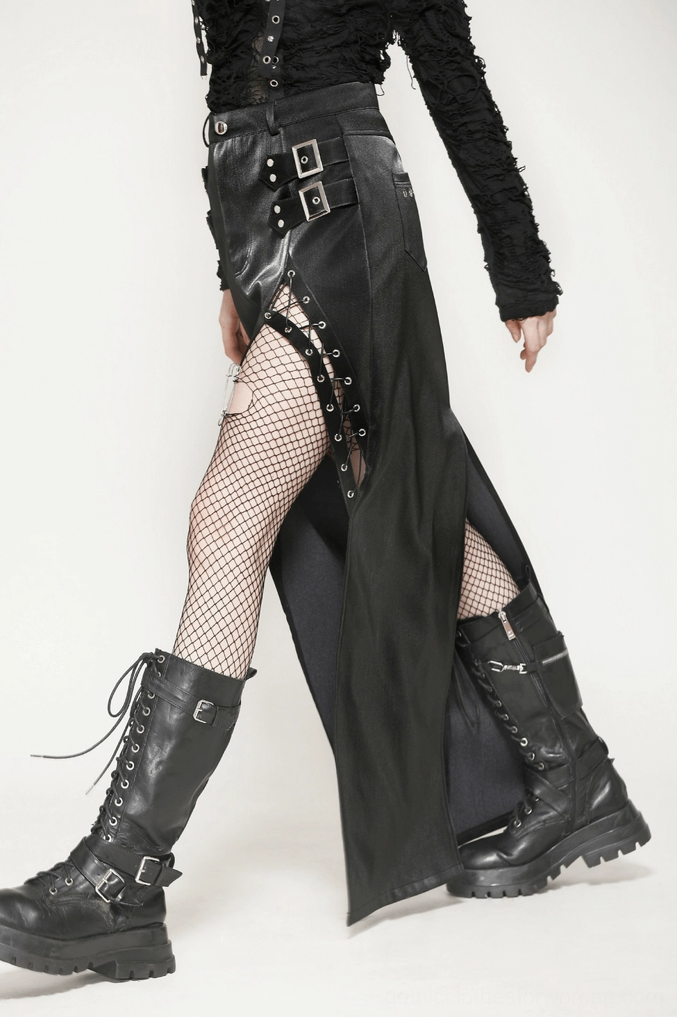 High-waisted black PU leather asymmetrical gothic skirt showcasing structured silhouette and rebellious alternative fashion style