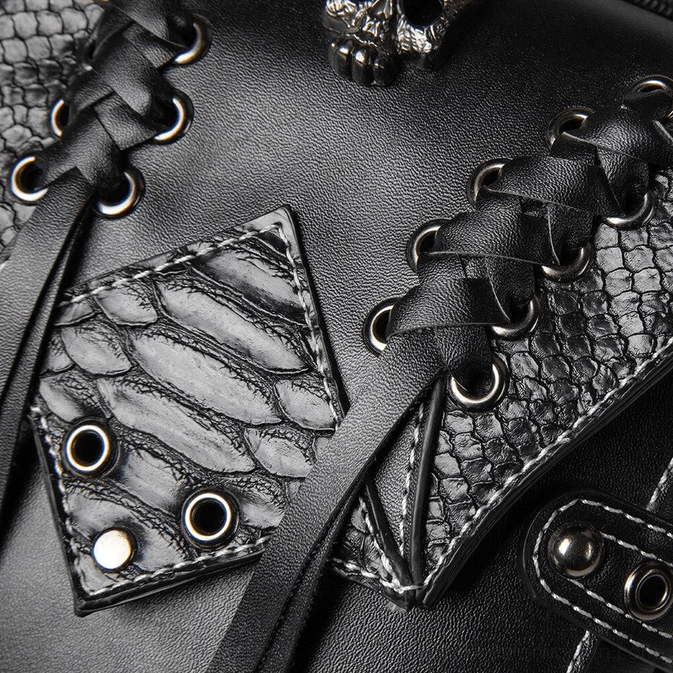 Textured leather panel with lace-up straps and metal studs detail close-up