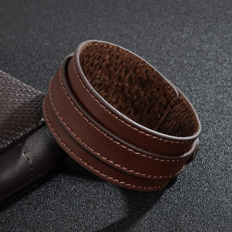 Gothic leather wristband double-layer construction showing reinforced stitching, premium PU leather with industrial punk aesthetic