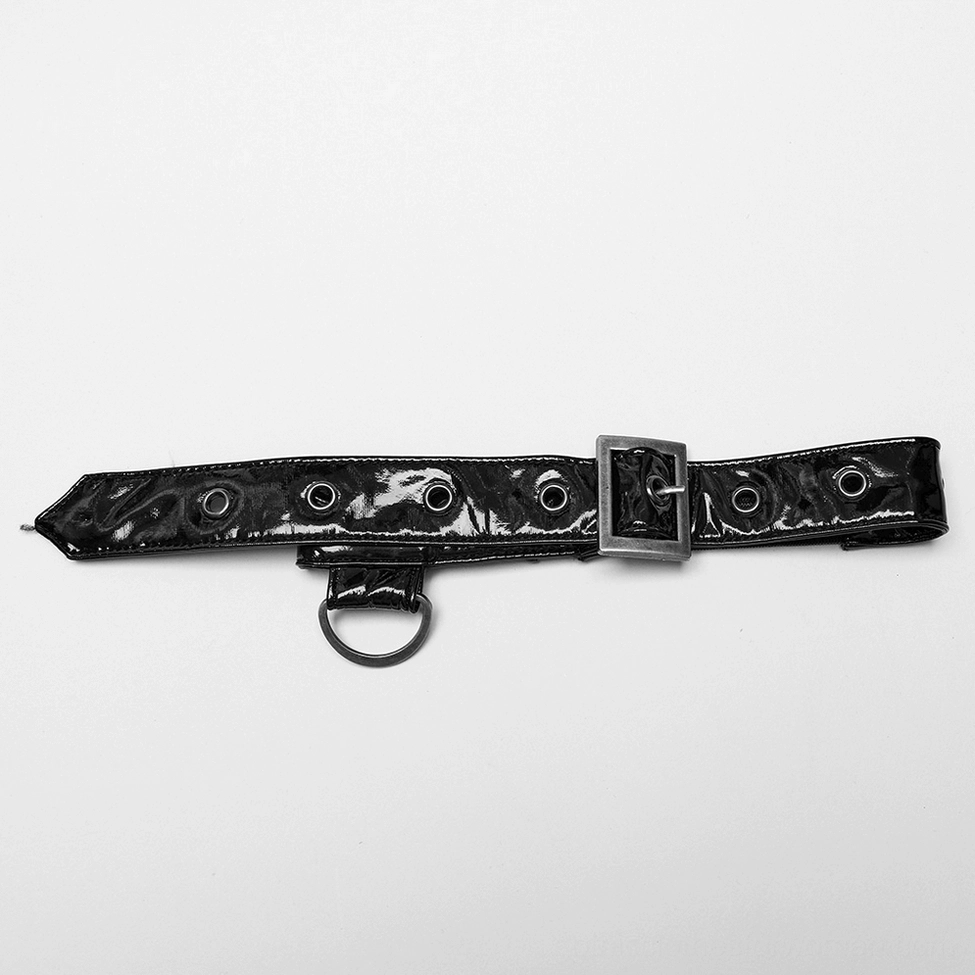 Flat lay product shot of detachable thigh strap accessory featuring patent leather construction, metal D-ring hardware, and adjustable buckle closure