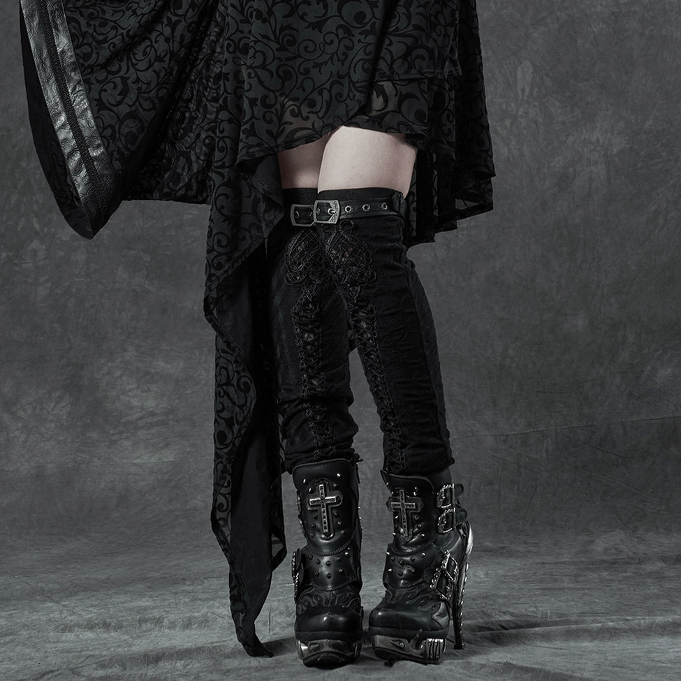 Full product shot of black gothic knee-high leg warmers with metal buckles and embroidered details on white background