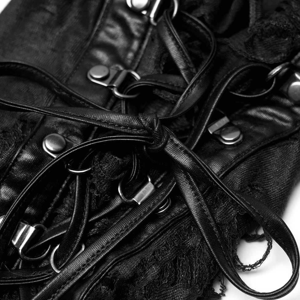 Close-up detail of gothic leg warmers metal hardware including silver buckles, leather straps with eyelet holes, and lace-up ties
