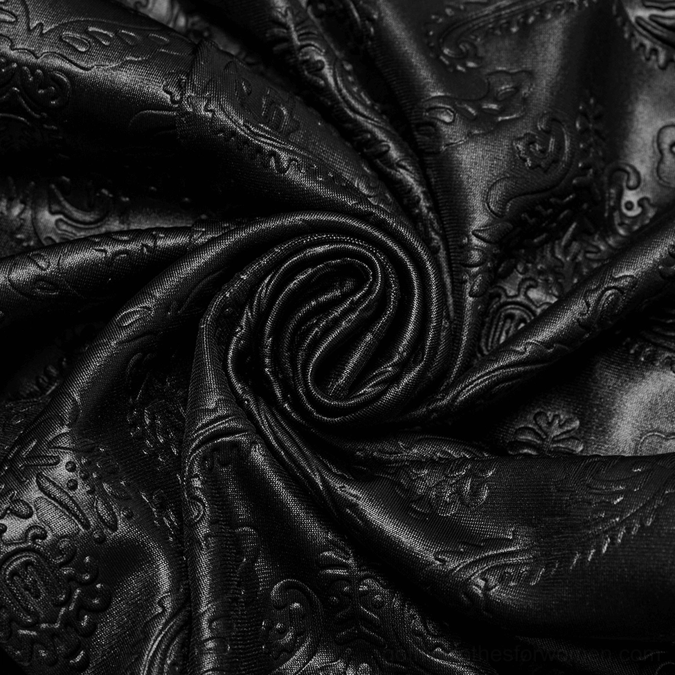 Embossed paisley texture detail on black gothic leggings fabric, close-up shot