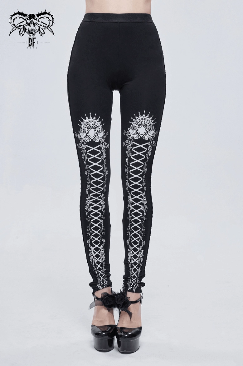 Full length black gothic leggings with ornamental white print styling with alternative fashion accessories