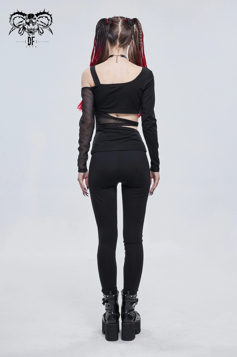 Asymmetrical black gothic leggings flat lay showing complete garment construction with horror prints and metal accents