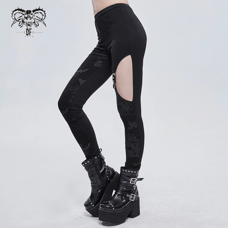 Gothic asymmetrical leggings flat lay detail shot highlighting spooky horror print design and asymmetric construction
