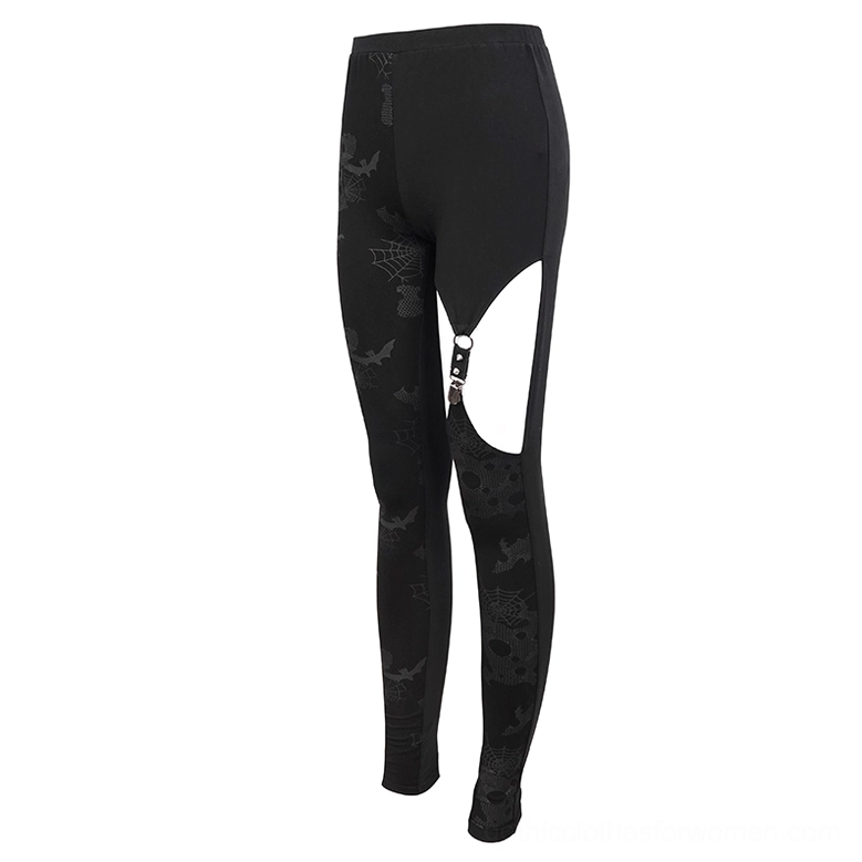Asymmetrical gothic leggings flat lay side view showing spooky horror pattern prints and curved asymmetric cut design