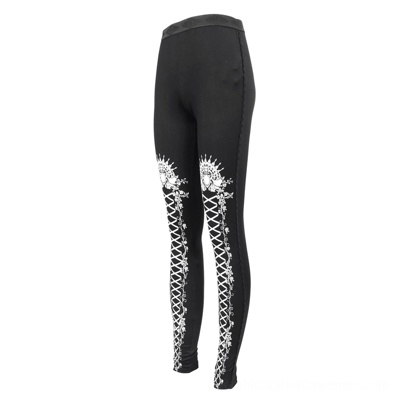 Gothic rose leggings side flat lay view with white lace-up floral prints and black waistband