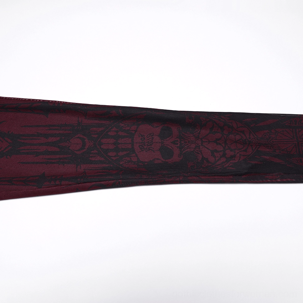 close-up of burgundy gothic leggings leg section skull motif sheer mesh fabric