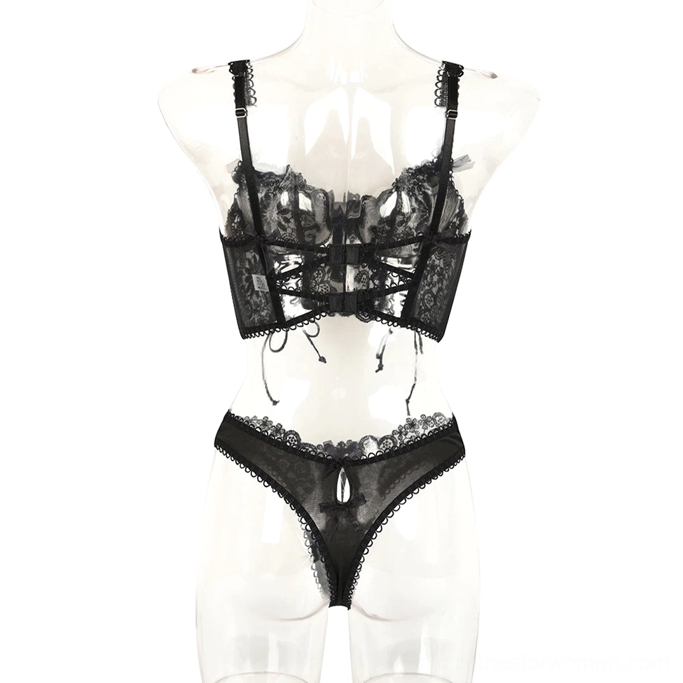 Black gothic lingerie set back view on mannequin showing crisscross straps and sheer back panel