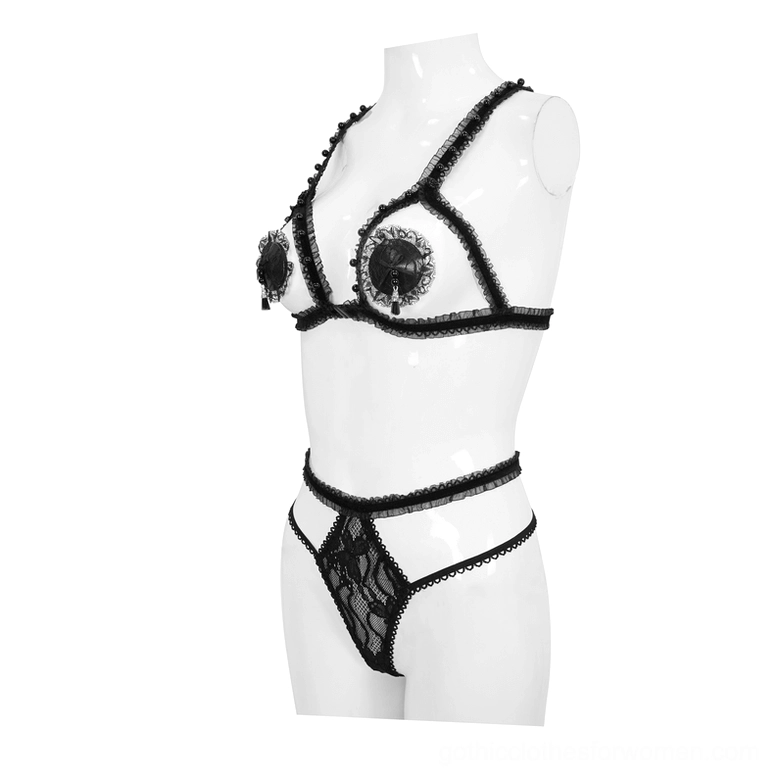 Black gothic lingerie set side-front view on mannequin, highlighting strappy bra construction and ruffled shoulder trim