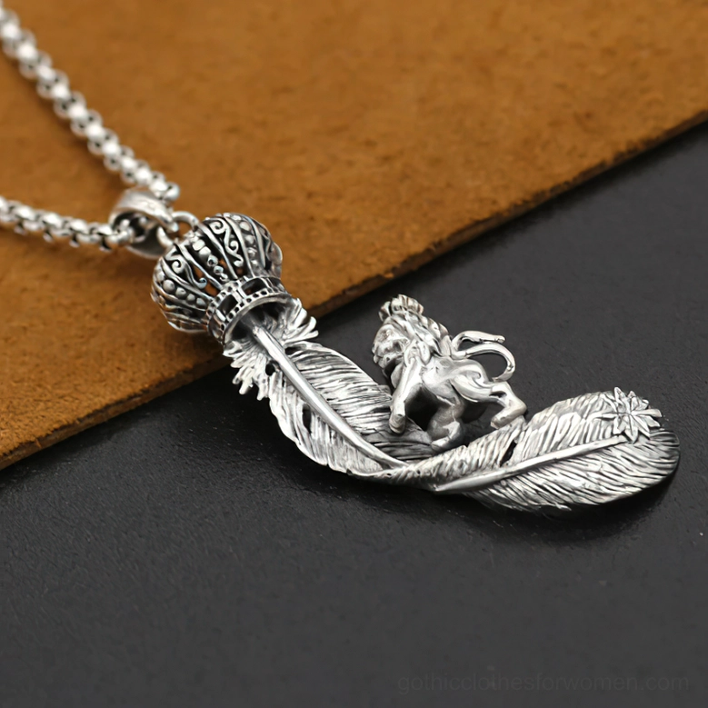 Close-up detail of gothic lion crown feather pendant, intricate texture work and vintage silver metal finish, heraldic lion ornament and delicate feather carving