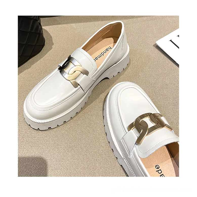 Cream gothic platform loafers top-down flat lay view displaying smooth split leather upper, gold chain vamp decoration, and cushioned printed insole design