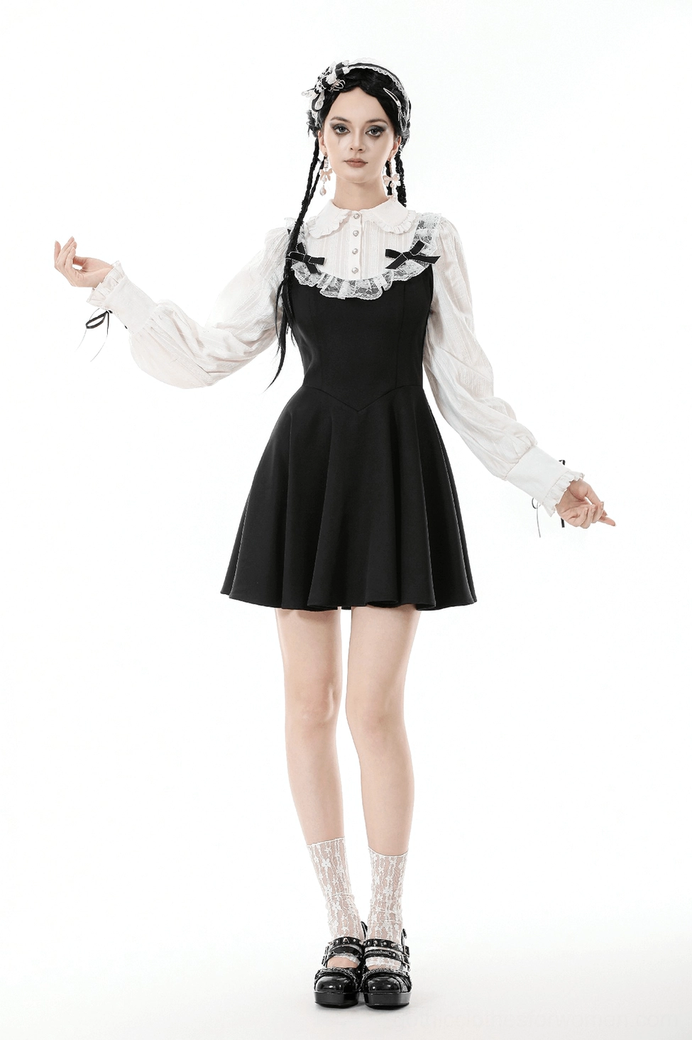 Gothic lolita dress front fitted bodice detail with contrast black ribbons and structured black-white fabric design