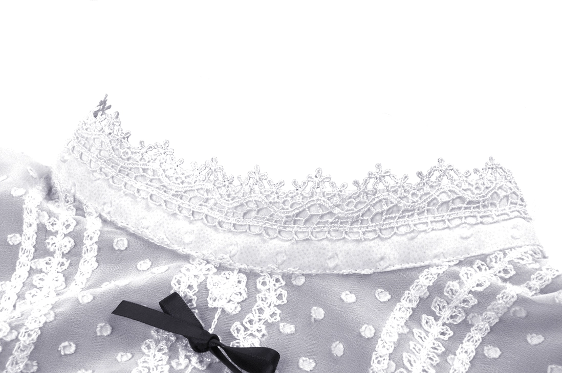 Close-up detail of Gothic Lolita dress collar showing lace ruffle, satin bow, and embroidered mesh fabric