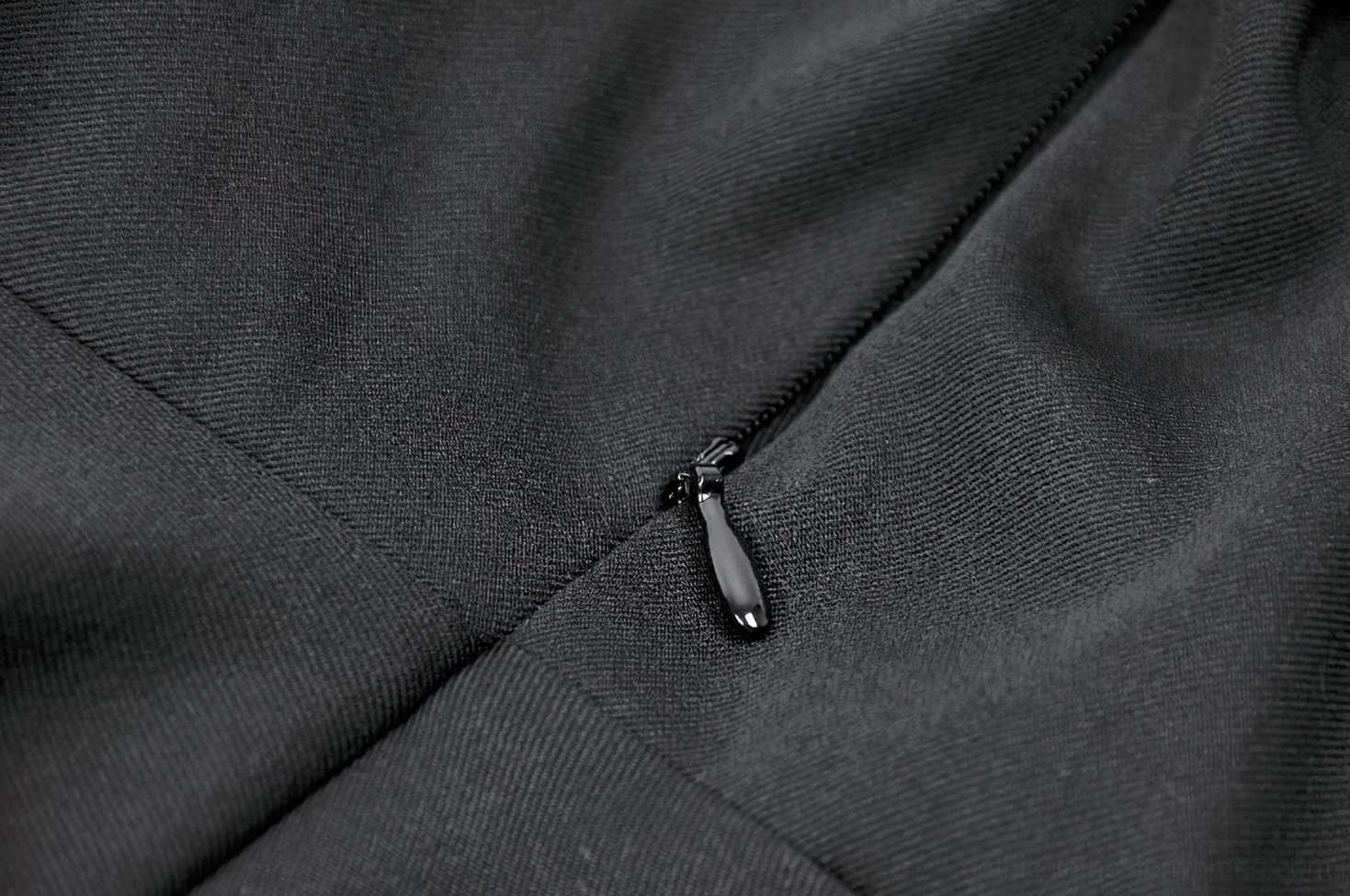 Victorian gothic lolita dress construction detail showing intricate lace trim, ribbon embellishments, and structured seaming