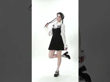 Victorian gothic lolita dress full body view on model with short a-line mini skirt and matching two-tone black-white colorway