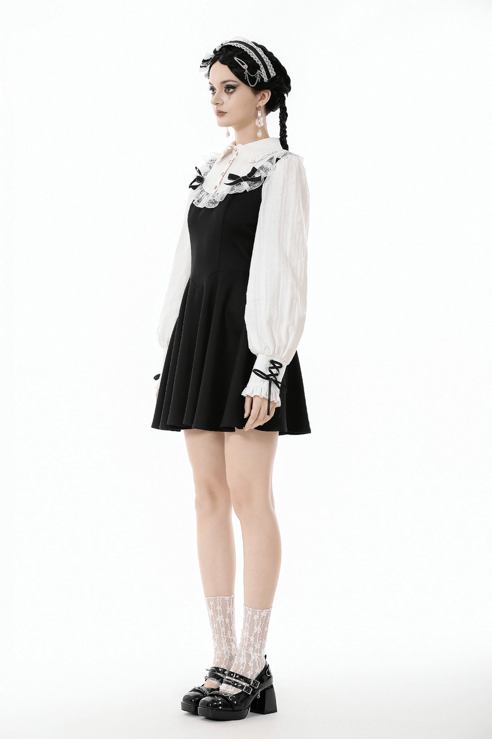Black and white gothic lolita dress overall styling view showing complete two-piece dress aesthetic with decorative elements