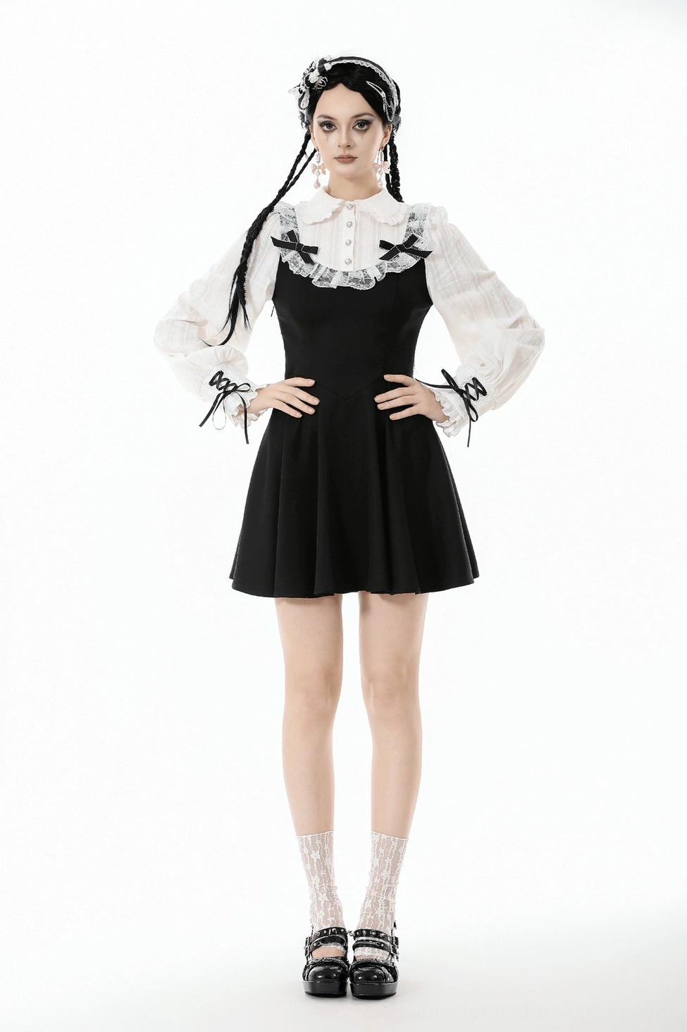 Black and white gothic lolita dress worn on model showing movement, drape, and realistic wear aesthetic