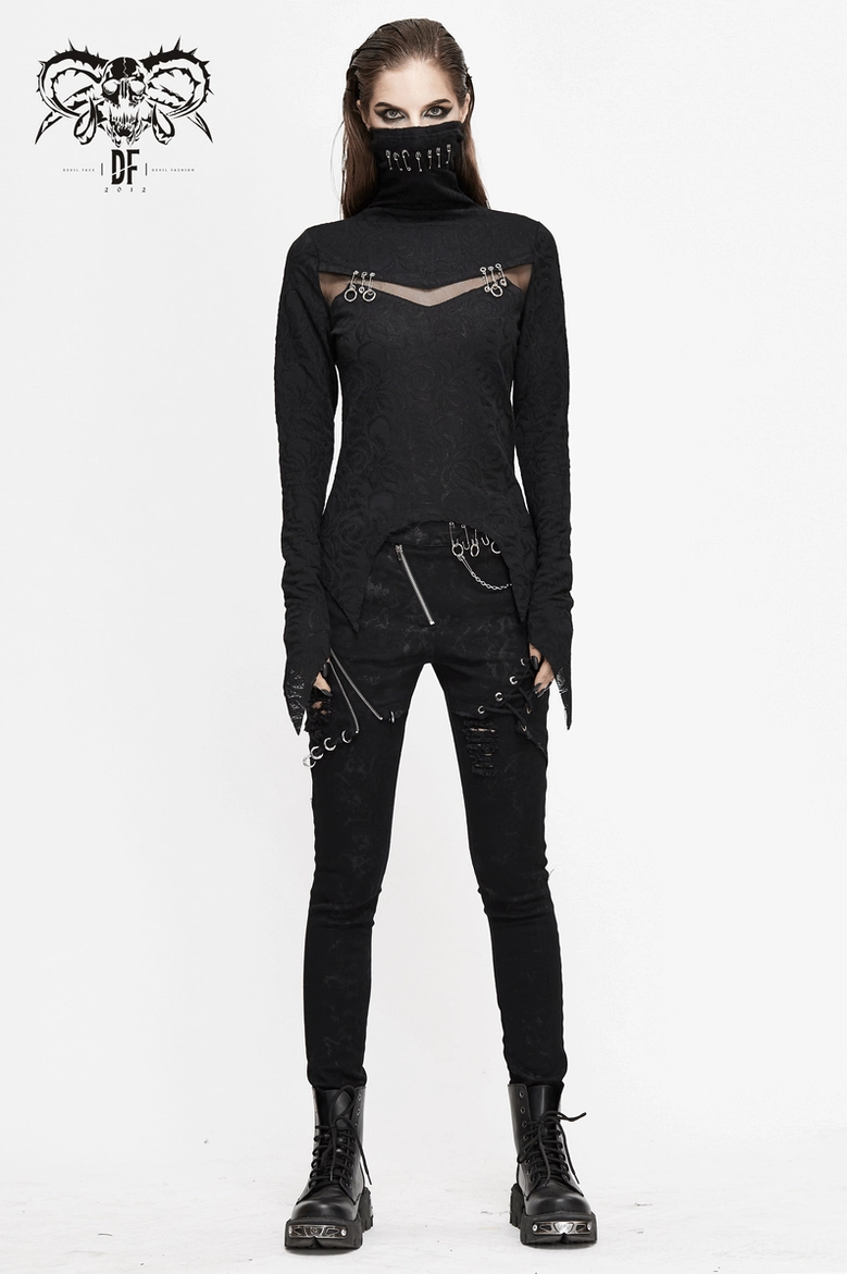 Black gothic long sleeve top with face-covering neckline paired with chain-detailed pants and combat boots