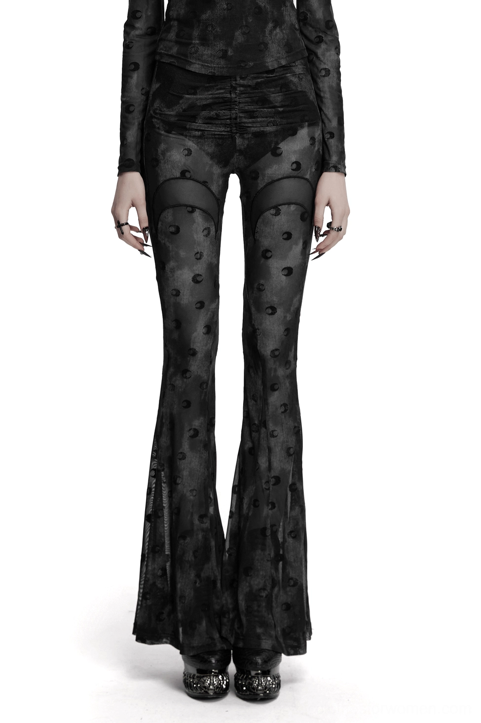 Woman wearing lunar crescent mesh flare pants with pleated waist - front full view showcasing moon print and transparent mesh detail