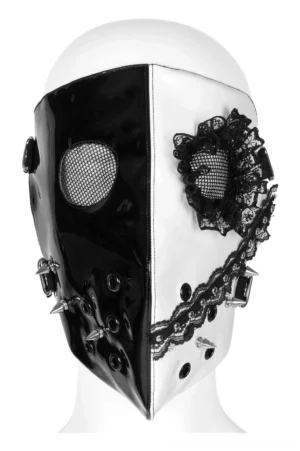 Gothic two-tone patent leather mask close-up on mannequin head, split black-white design with intricate lace flower decoration