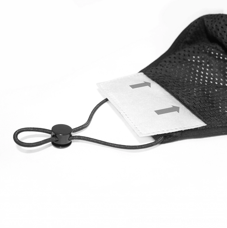 Macro close-up side view showing mesh inner lining, filter slot, and black elastic cord adjuster mechanism