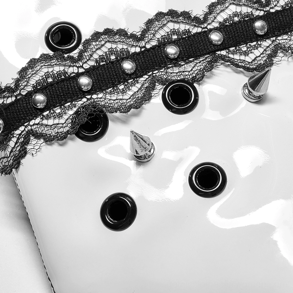 Decorative details of gothic mask lace trim with metal studs and spike ornament hardware