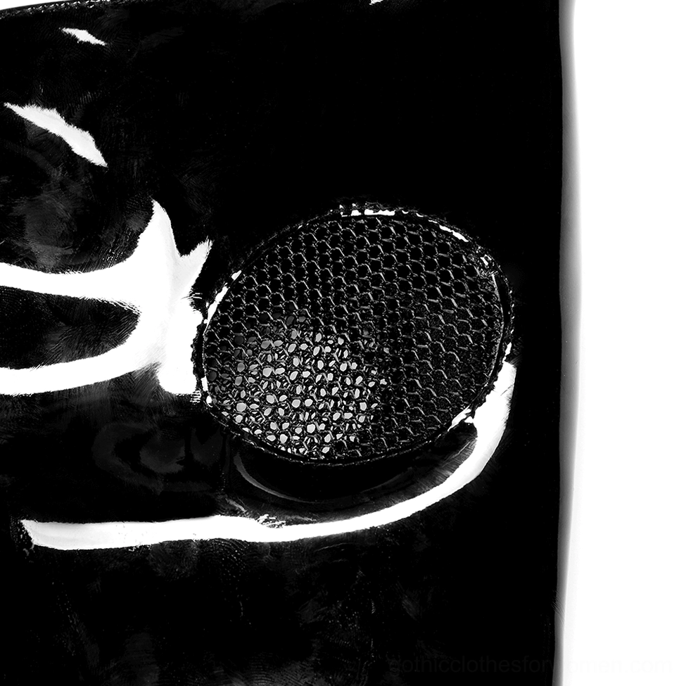 Close-up of gothic mask eye vent with mesh fabric ventilation cover and glossy black patent leather frame