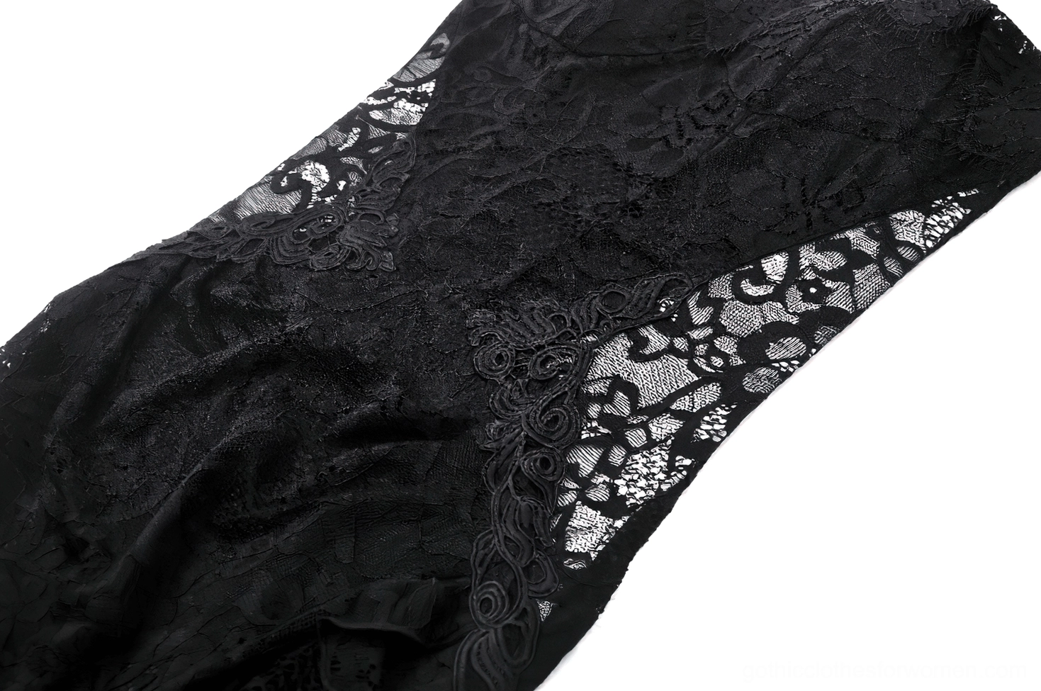 Close-up detail of black lace gothic maxi dress showing floral lace texture and sheer mesh overlay