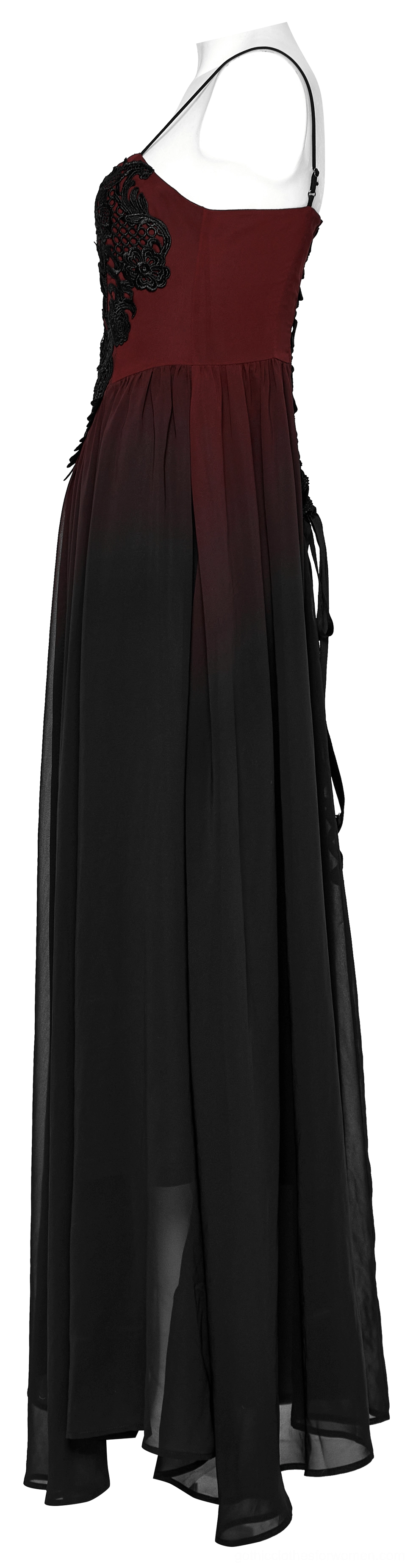 Side profile of gothic dress showing fitted corset and floor-length sheer chiffon layers