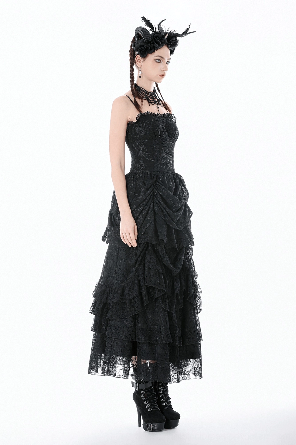 Side view of black gothic lace maxi dress with tiered lace skirt and fitted bodice detail