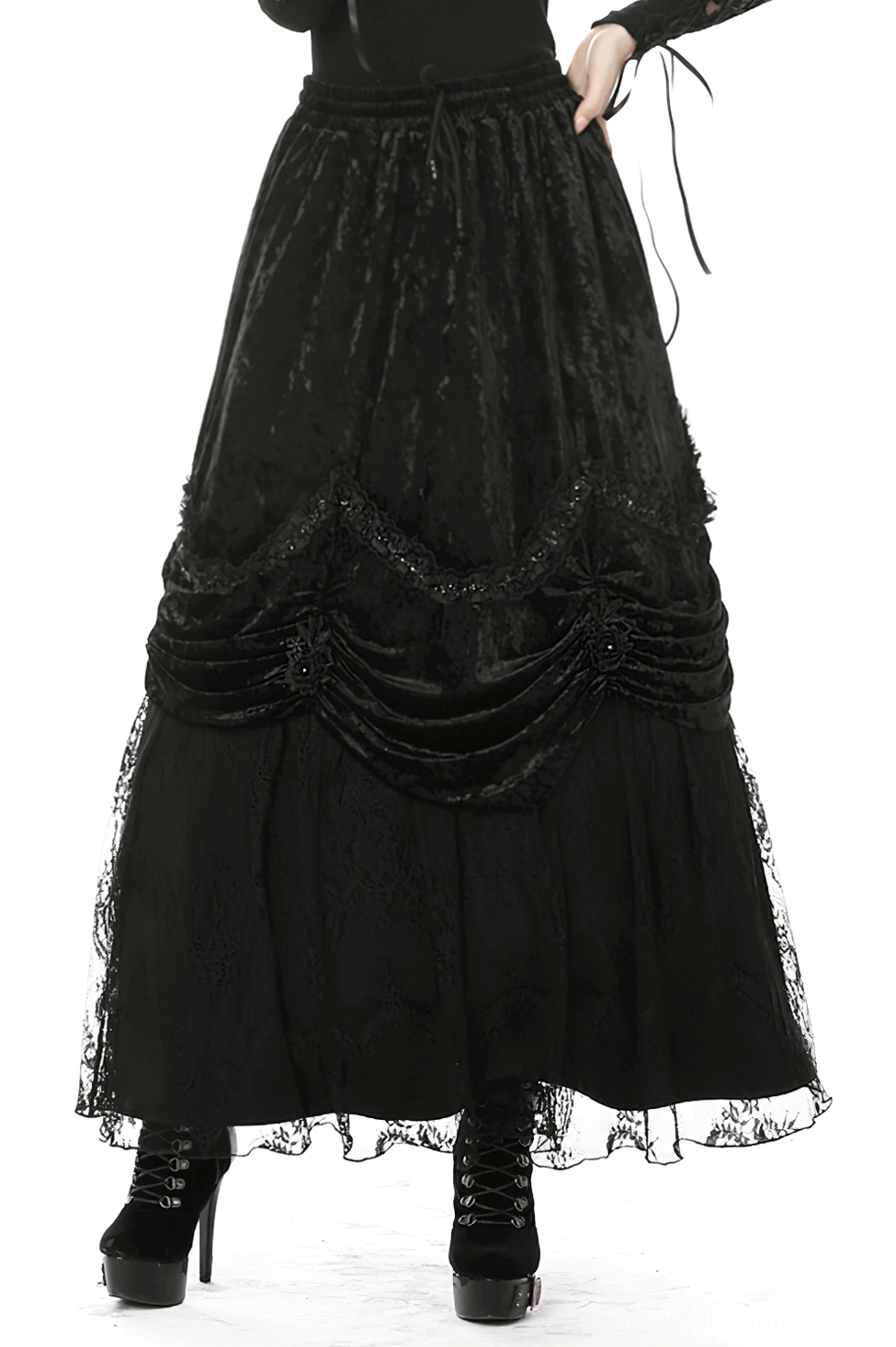 Black crushed velvet gothic maxi skirt front view with ruched drape and lace hem detail