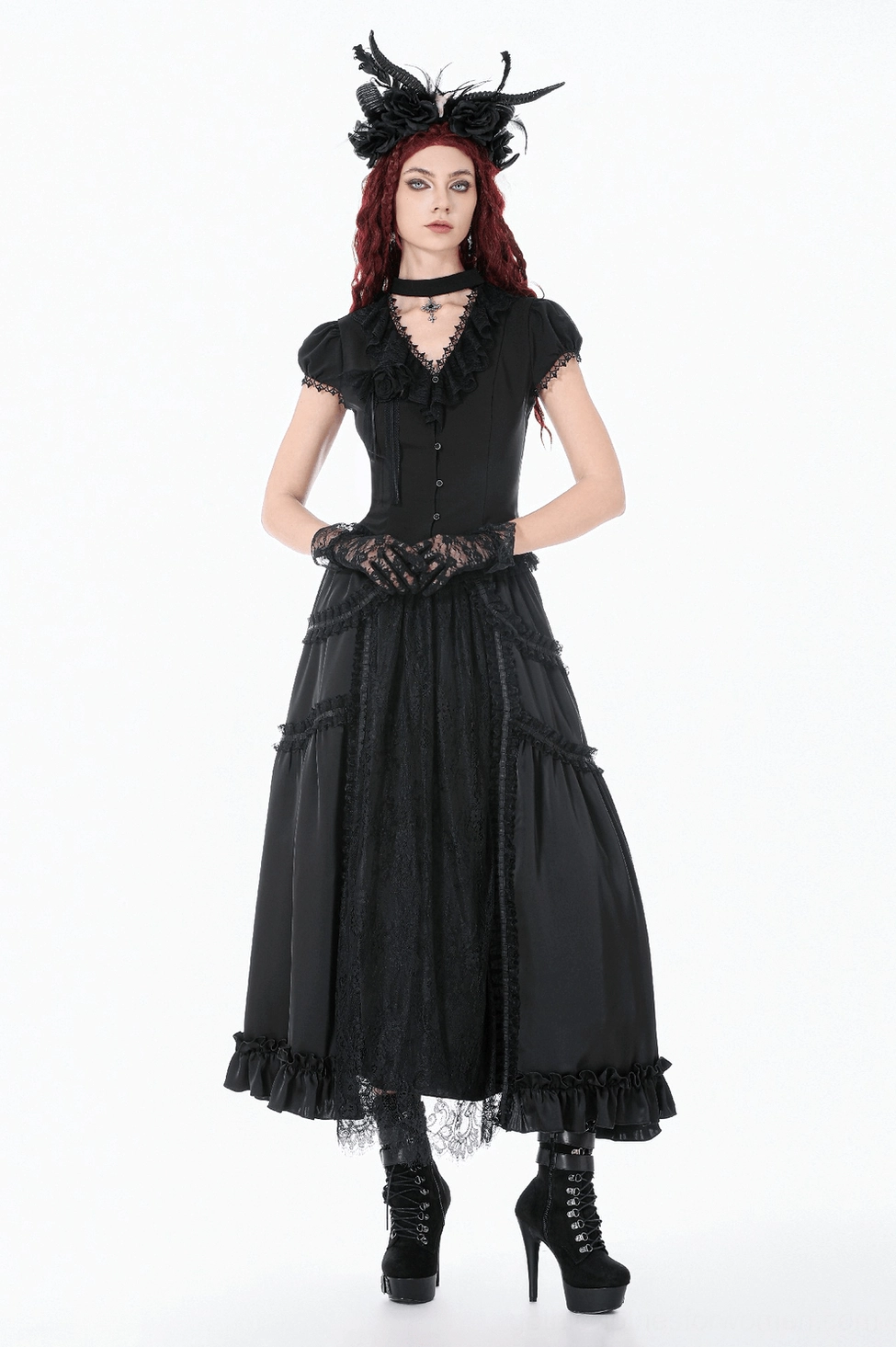 Black gothic maxi skirt fashion styling shot with dramatic lace overlay and ruffled hem details