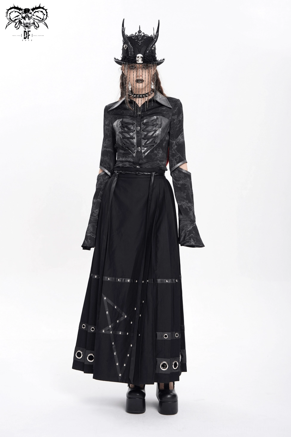 Black gothic maxi skirt faux leather waist tie detail close-up showing texture and fastening mechanism
