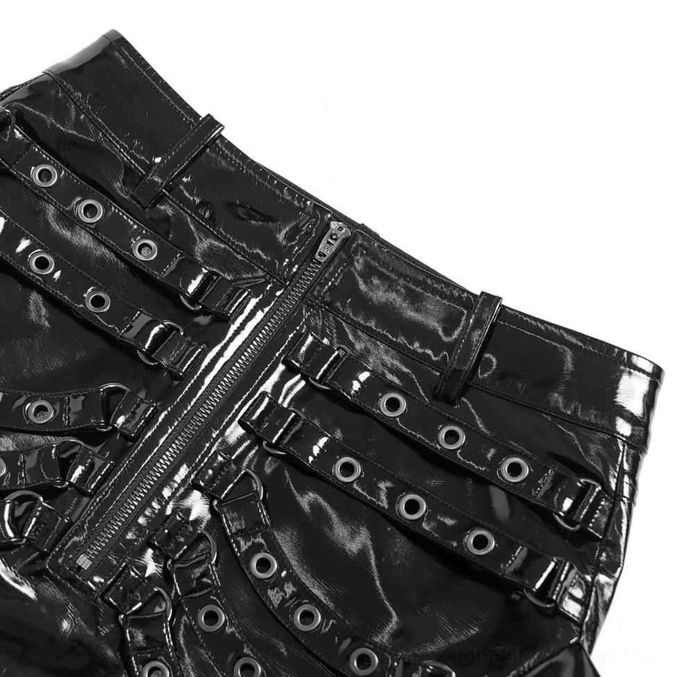 Close-up detail of black patent gothic maxi skirt waist hardware showing metal eyelet grommets, adjustable buckle straps, and front zipper