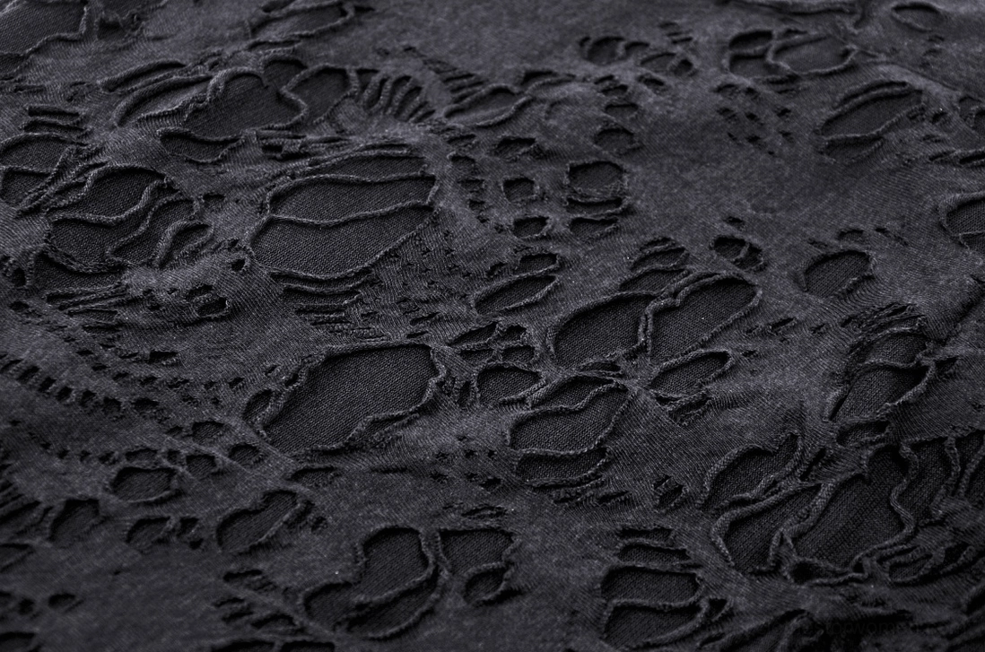 Black gothic skirt detail showing hem construction, lace quality, and overall fabric drape characteristics