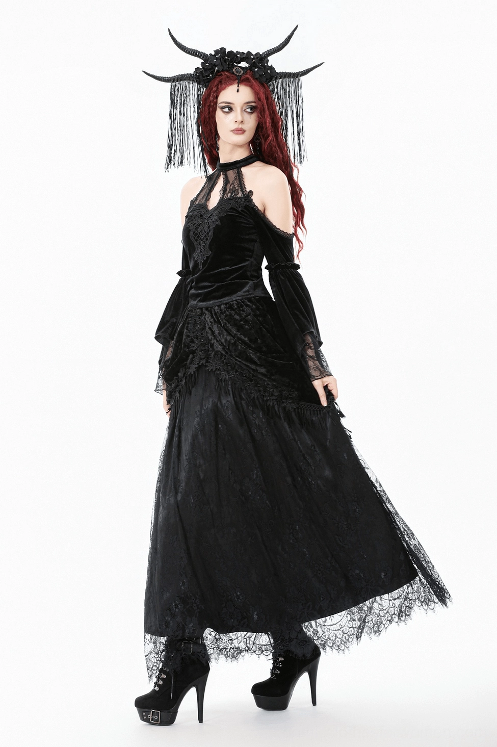 Detail view of gothic maxi skirt showing layered lace construction and fabric layering technique