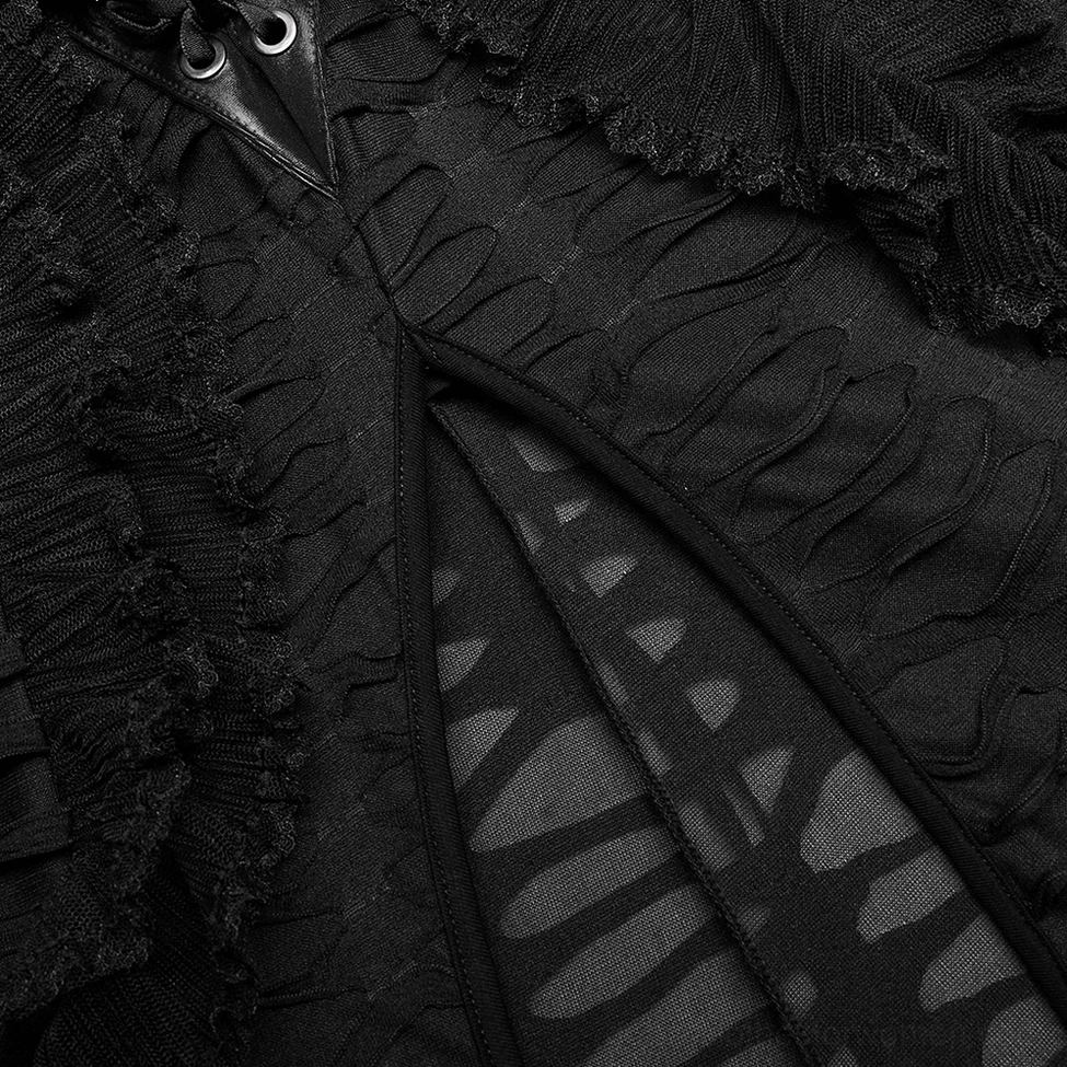 Close-up detail of black gothic maxi skirt high side slit and ripped mesh fabric texture with ruffled slit edge trim