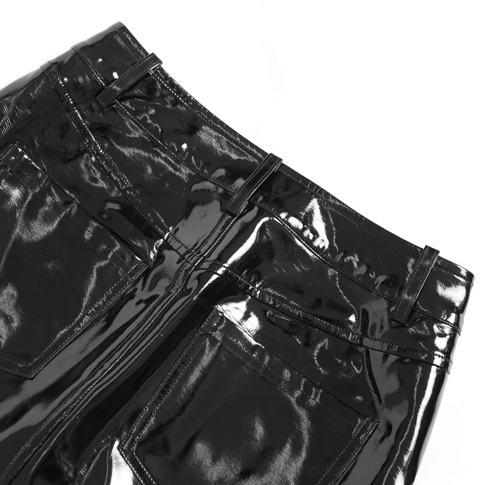 Black patent leather gothic maxi skirt styled with cropped metallic top and platform boots for cyberpunk aesthetic