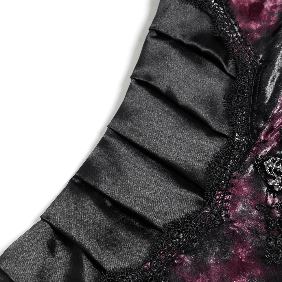 Close-up of black burgundy gothic mermaid dress side panels showing satin panels, lace trim, and velvet tie-dye pattern blend