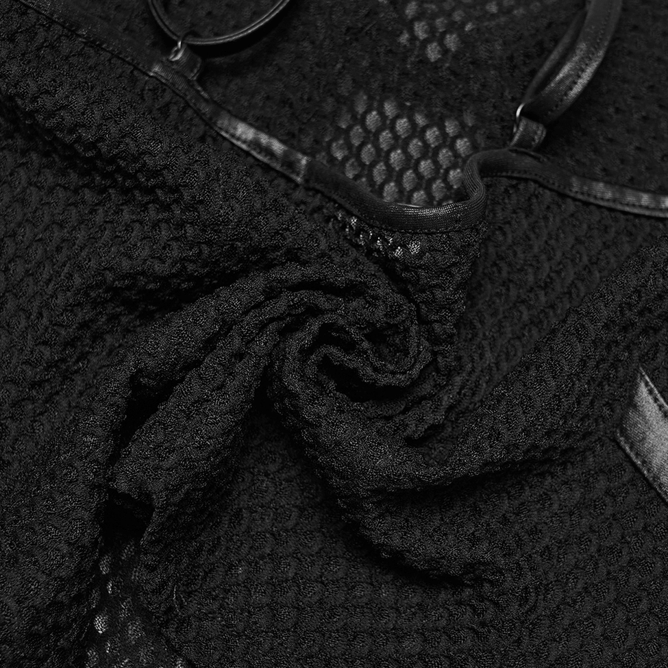 Close-up macro view of black gothic camisole mesh fabric texture and faux leather trim detail with stitching