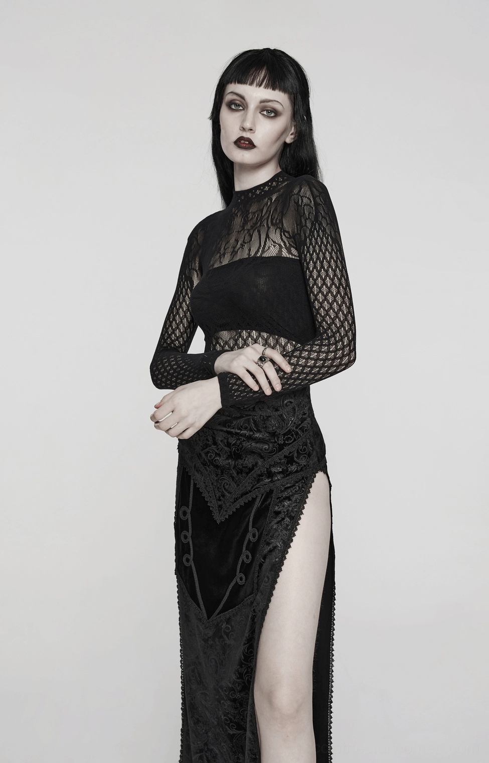 Gothic formal black mesh dress with slit details and sheer sleeves front partial view on female alternative model