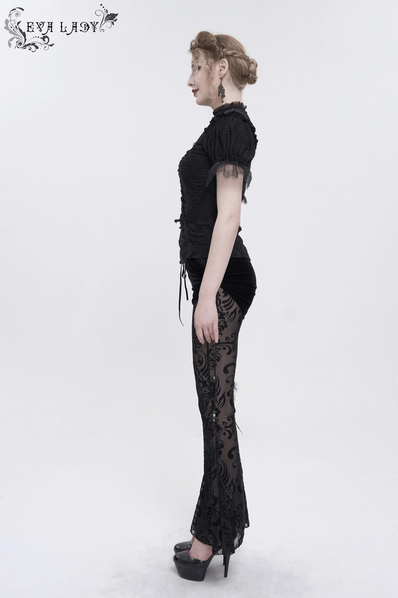 Angle view of gothic mesh flare pants highlighting the dramatic flare silhouette and mesh transparency