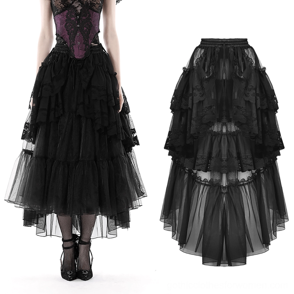 Front detail of black mesh gothic maxi skirt highlighting asymmetrical high-low hem and sheer tulle layers on model