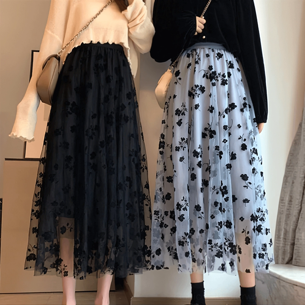 Black and blue gothic mesh midi skirts partial body view, high elastic waist, tulle fabric detail, lounge styling