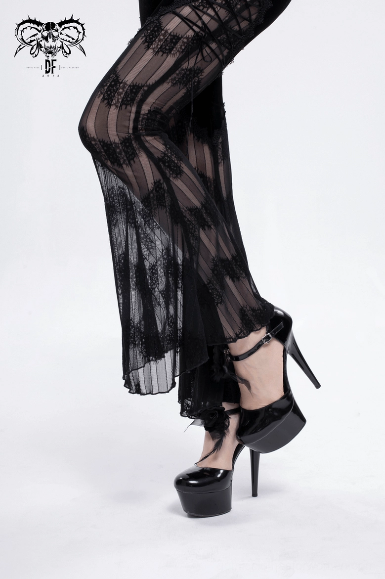 Gothic lace mesh flared pants on model showcasing alternative fashion styling and silhouette