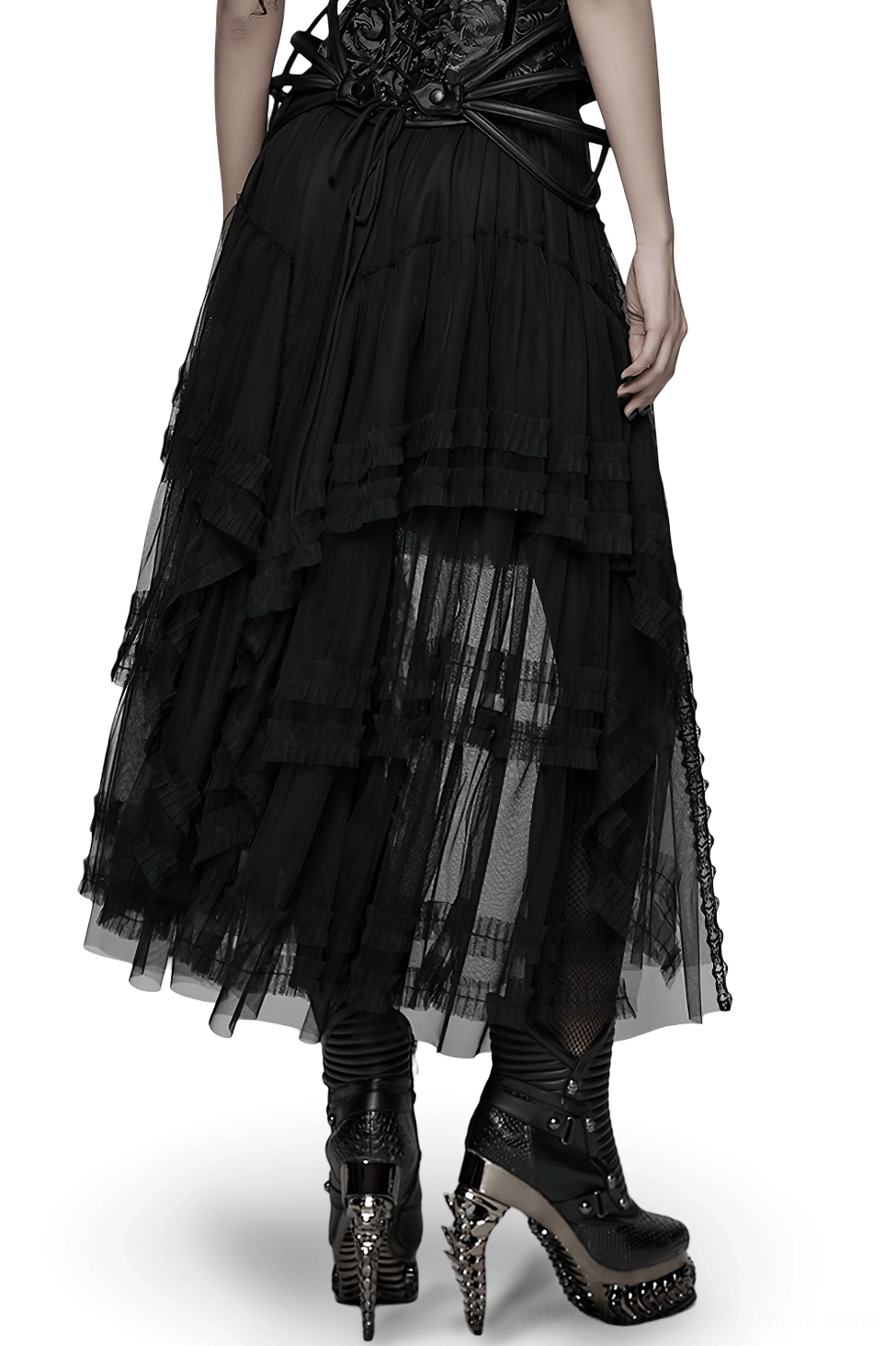 Black gothic mesh skirt back view showing layered sheer panels and high-low asymmetrical hem with platform boots