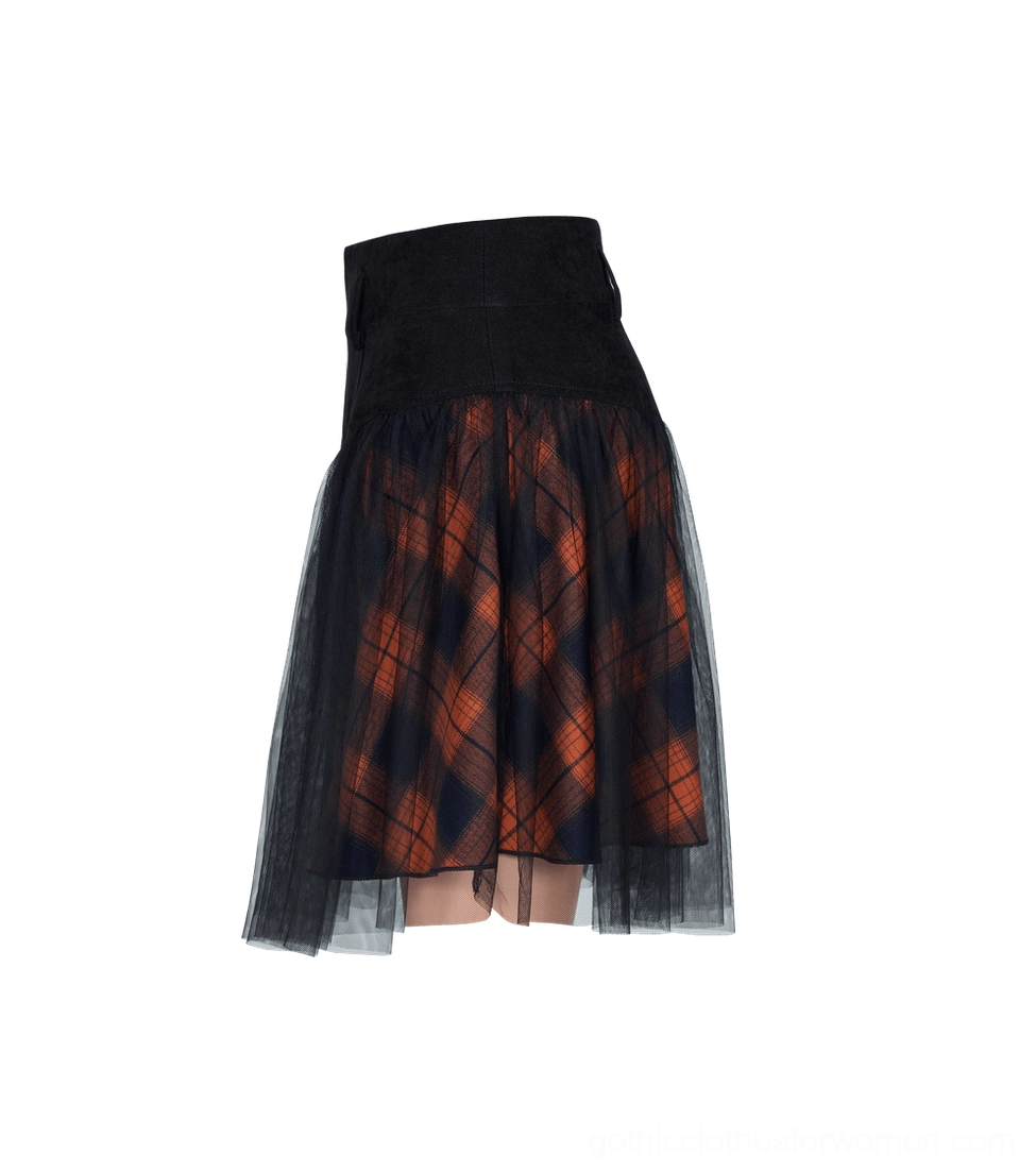 Side flat lay view of black and orange plaid gothic mesh skirt showing structured black suede-style waist panel and layered mesh hem detail