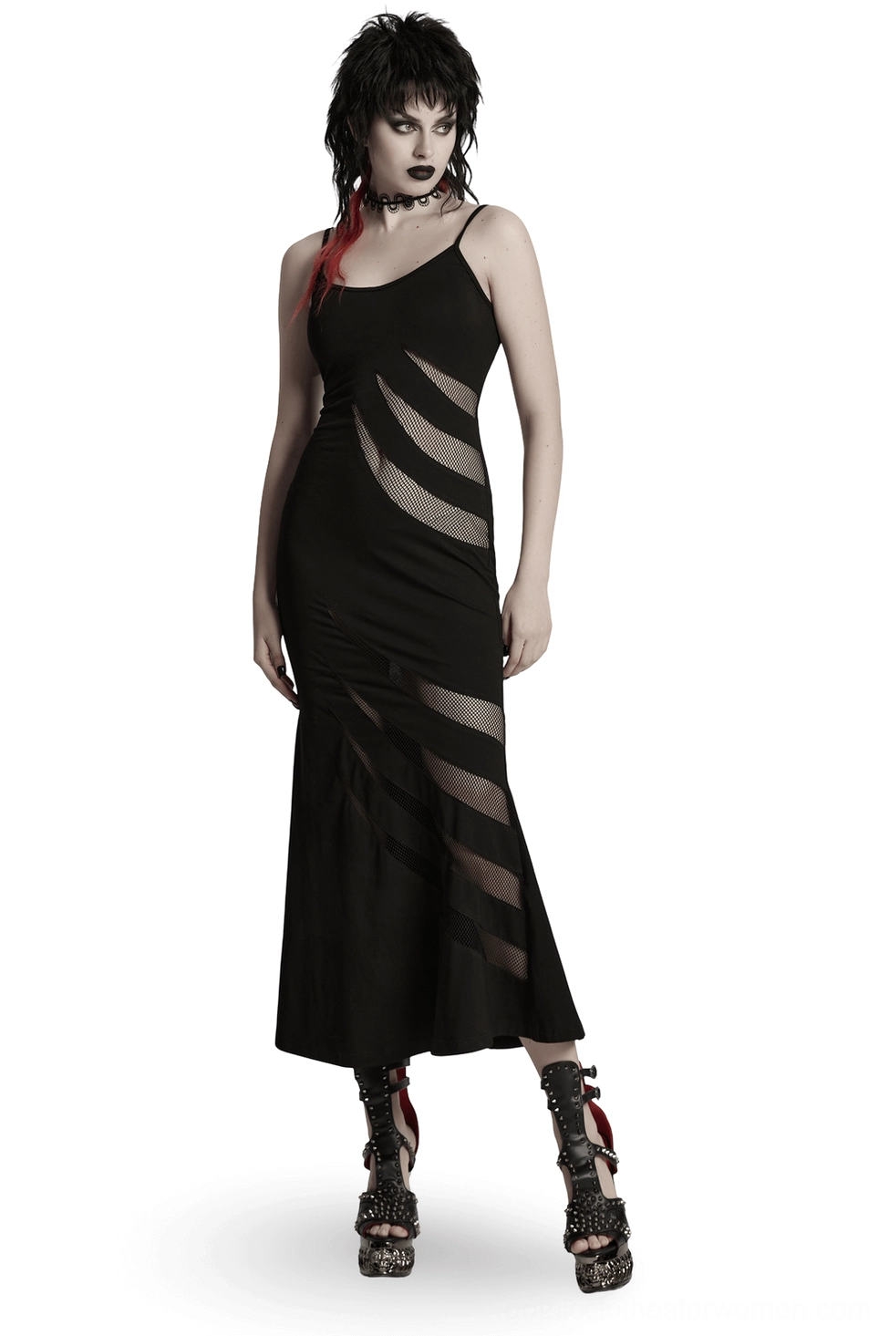 Front three-quarter view of black asymmetric claw slash mesh gothic slip dress with spaghetti straps and fishtail hem on model